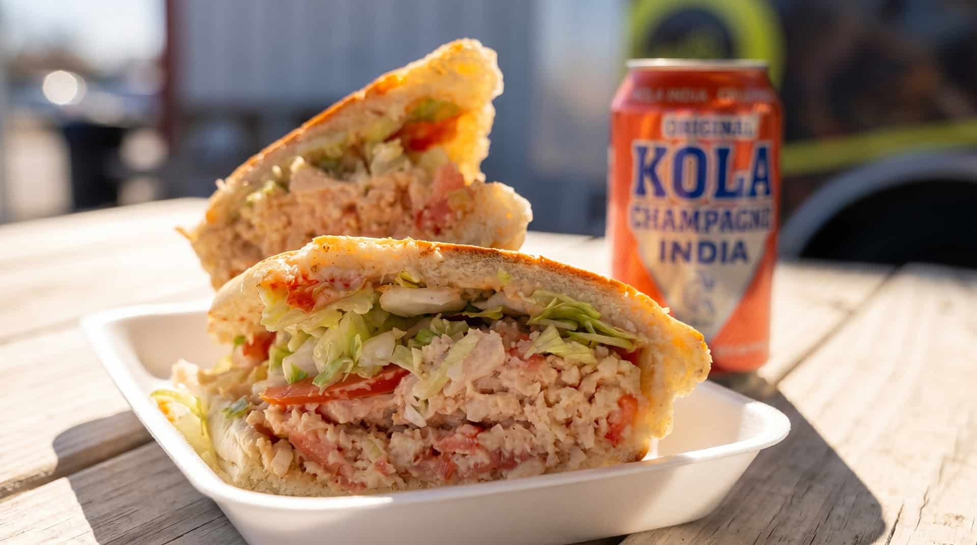 Puerto Rican sandwich served with a cold Kola Champagne soft drink